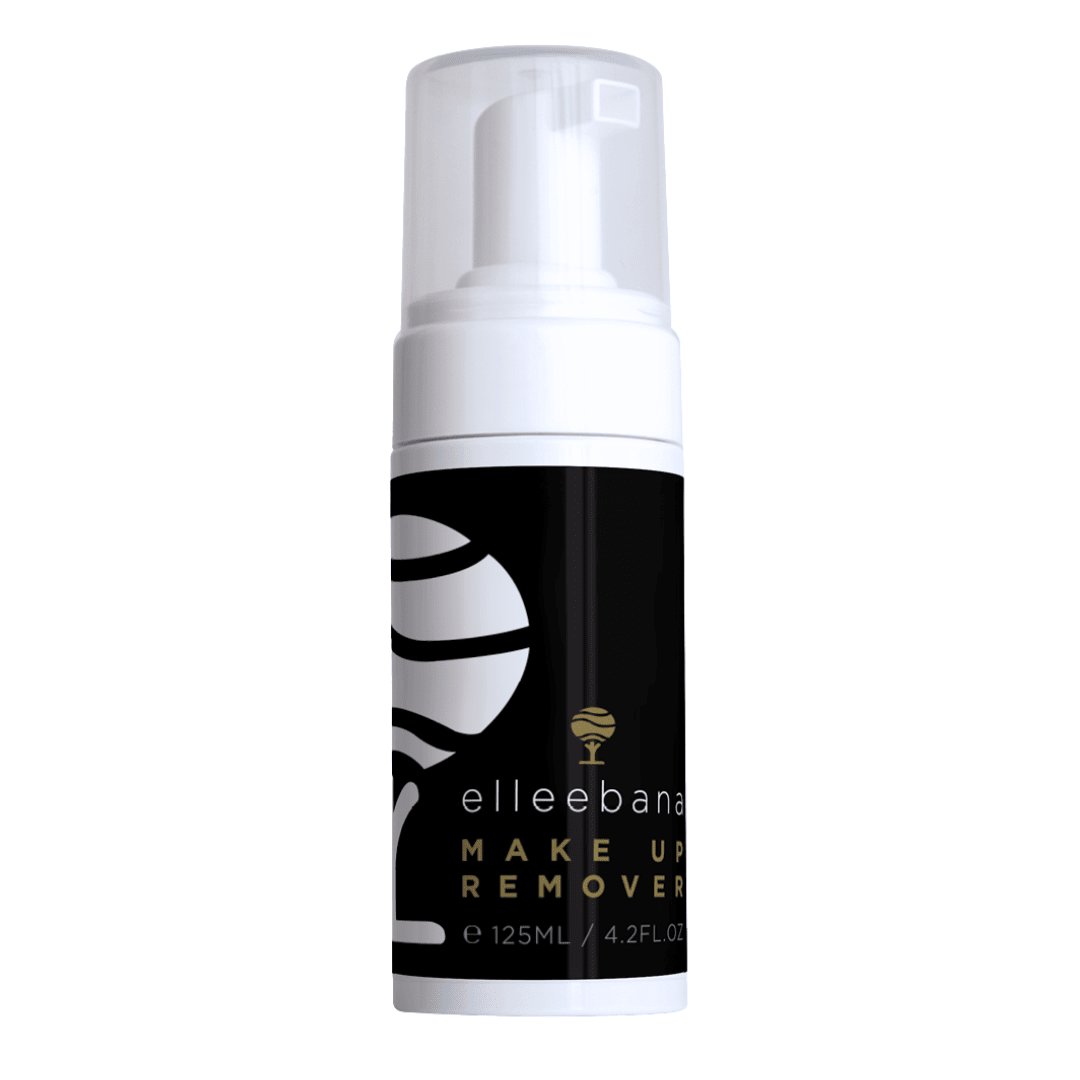 Lash technician using Elleebana Foaming Cleanser and a brush to gently remove oils and makeup from natural eyelashes.